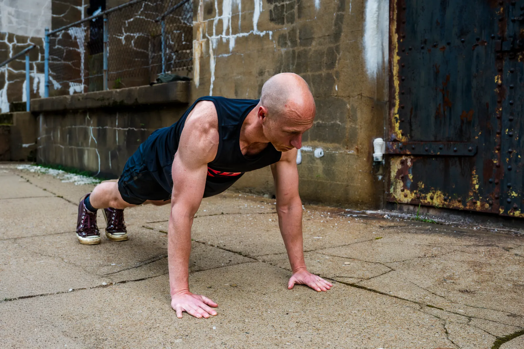 Busy Dad Training Level 1 practitioner demonstrating a foundational workout movement