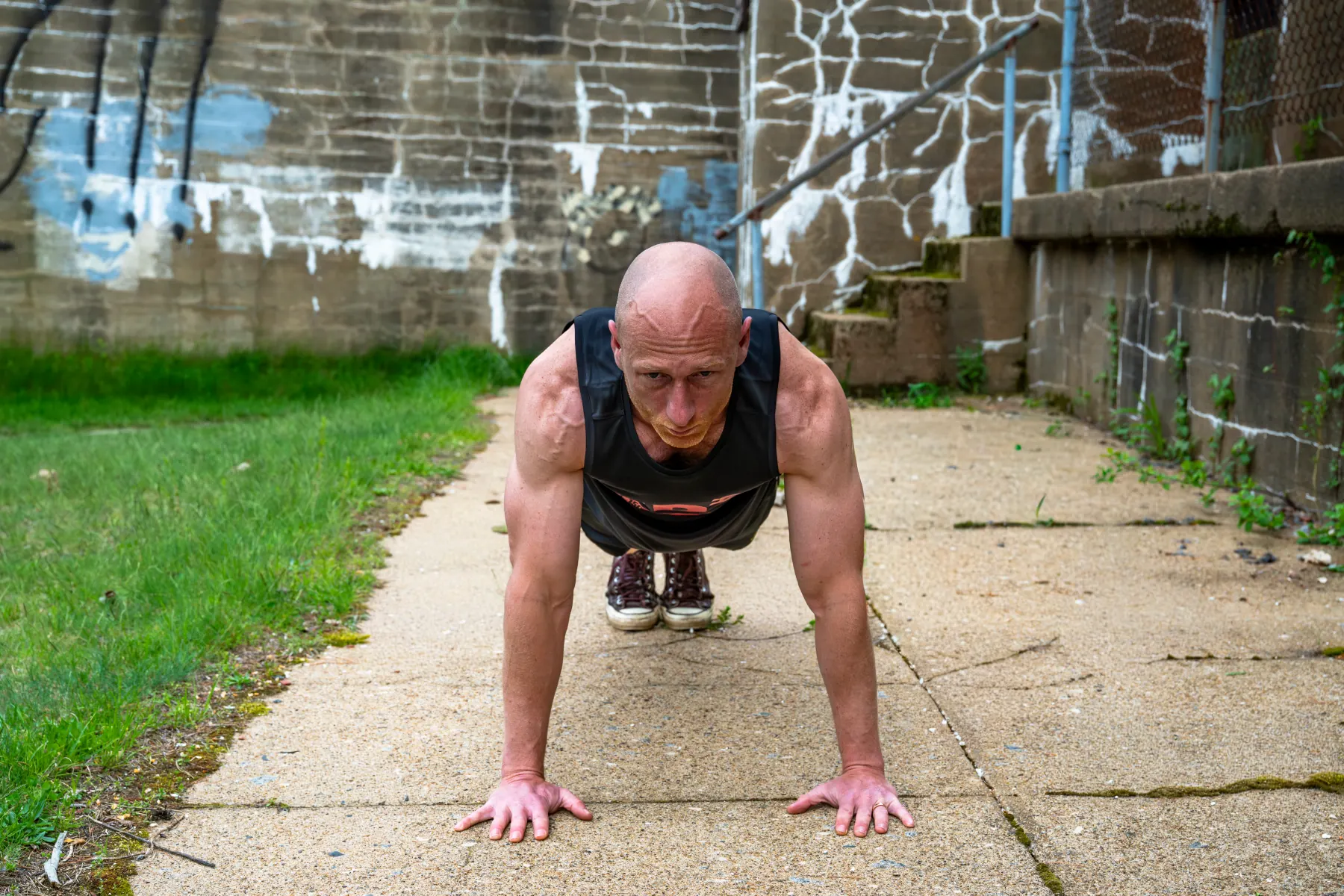 Busy Dad Training Level 3 practitioner performing an advanced workout movement