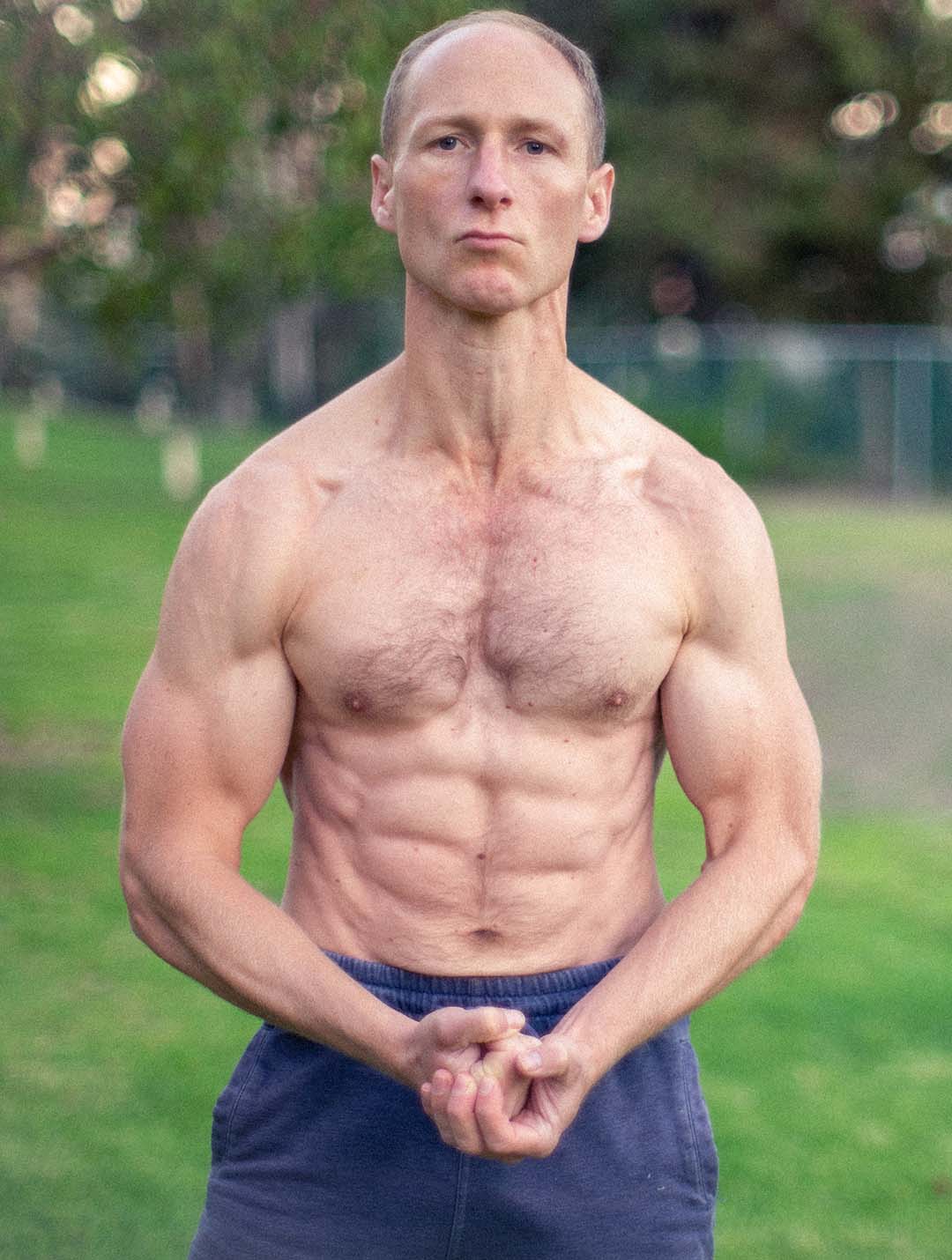Busy Dad Training coach demonstrating bodyweight exercise form